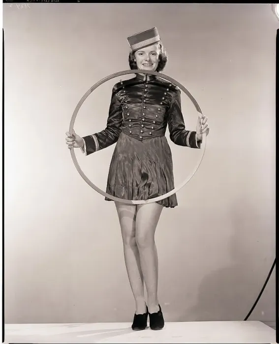 Framed Print : Woman Dressed as Bellhop Framed Print : Woman Dressed as Bellhop