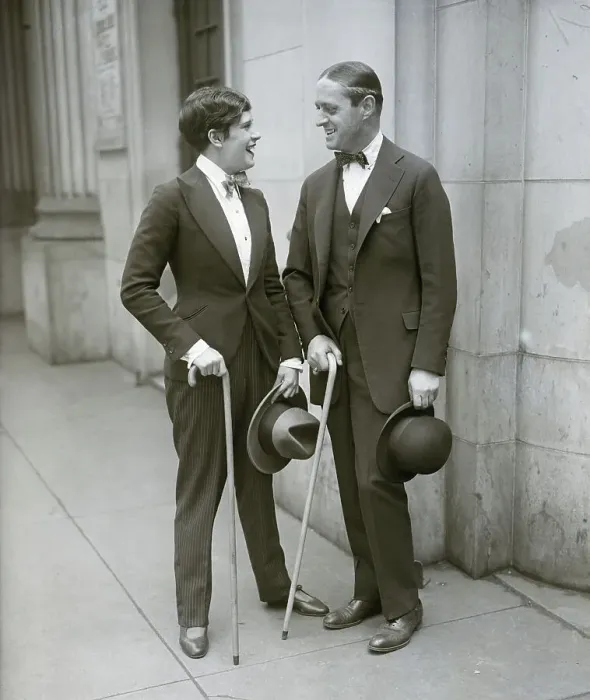 Framed Print : Woman Dressed Like Man Talks To Man Framed Print : Woman Dressed Like Man Talks To Man