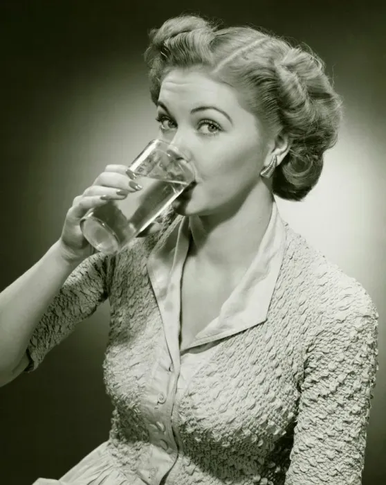 Framed Print : Woman drinking water from tall glass, (B&W), (Close-up), (Portrait) Framed Print : Woman drinking water from tall glass, (B&W), (Close-up), (Portrait)