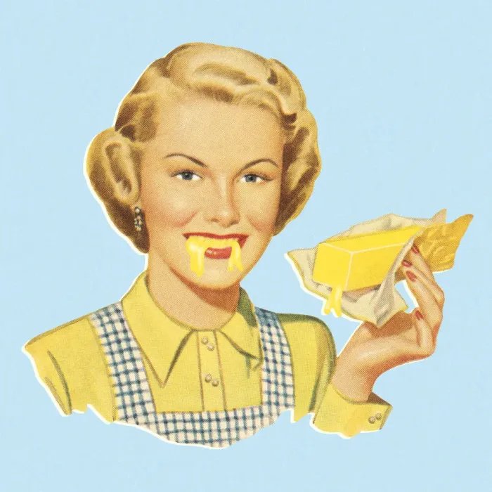 Framed Print : Woman Eating Butter Framed Print : Woman Eating Butter