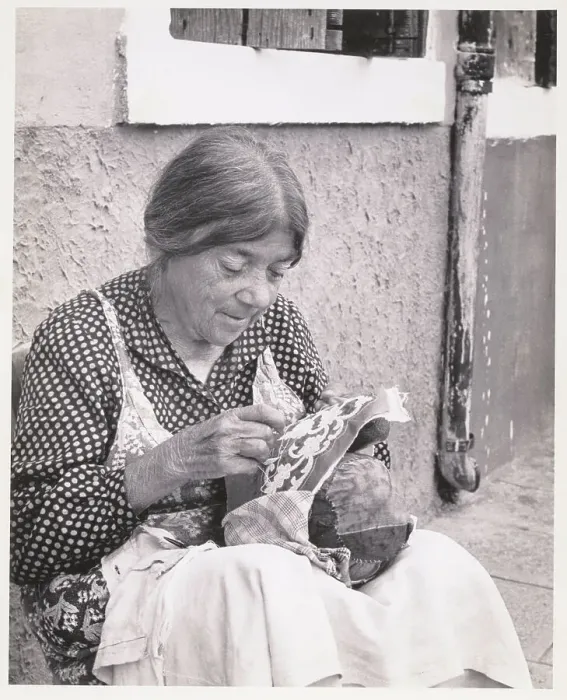Framed Print : Woman Embroidering Cloth Framed Print : Woman Embroidering Cloth