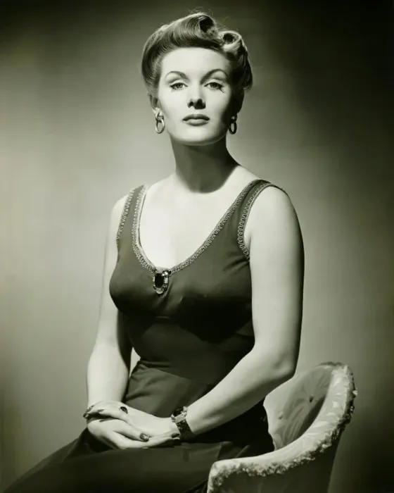 Framed Print : Woman in evening dress posing in studio, (B&W), portrait Framed Print : Woman in evening dress posing in studio, (B&W), portrait