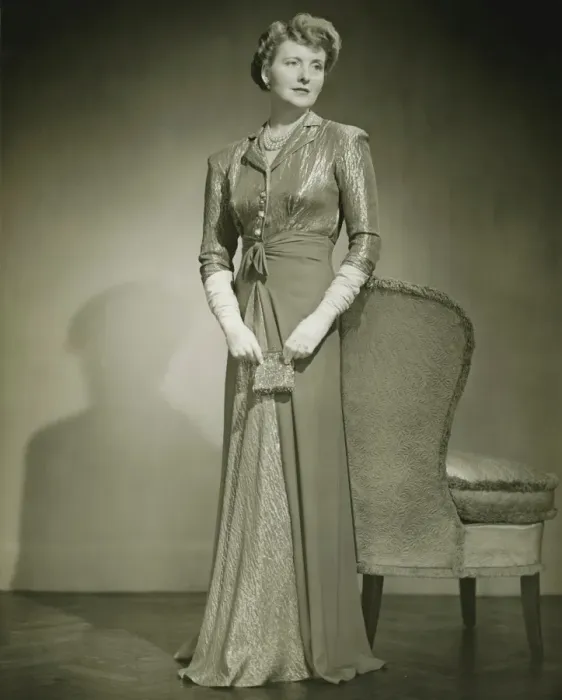 Framed Print : Woman in evening dress standing indoors, (B&W) Framed Print : Woman in evening dress standing indoors, (B&W)
