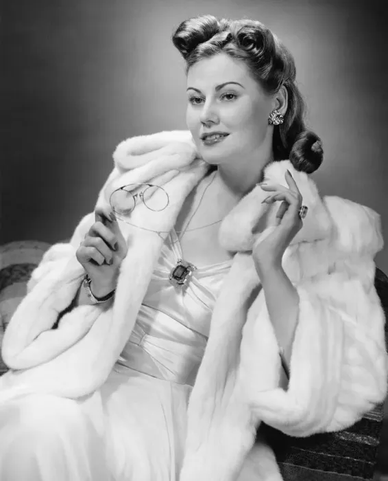 Framed Print : Woman in evening wear posing in studio (B&W), portrait Framed Print : Woman in evening wear posing in studio (B&W), portrait