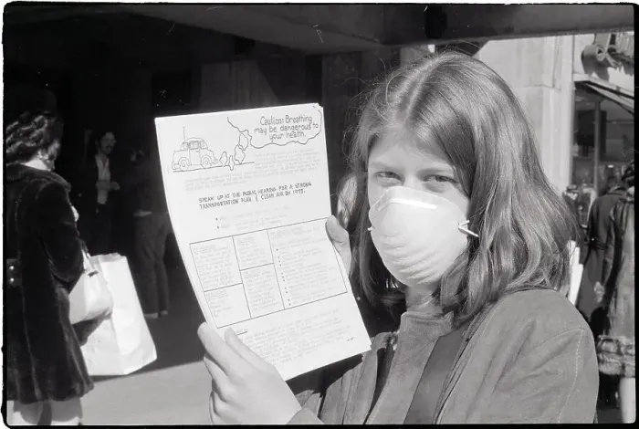 Framed Print : Woman In Face Mask Holding Flyer Framed Print : Woman In Face Mask Holding Flyer