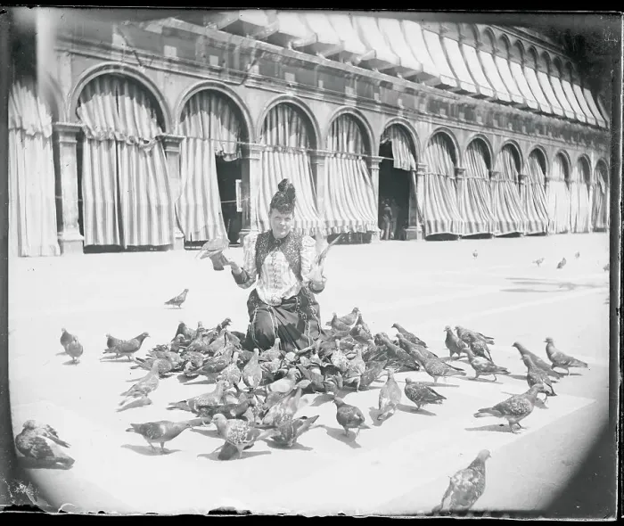 Framed Print : Woman Feeding Pigeons