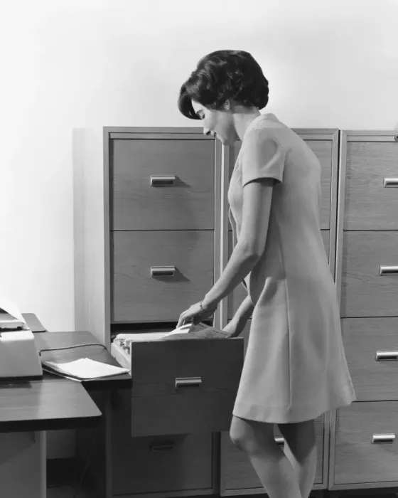 Framed Print : Woman filing Framed Print : Woman filing
