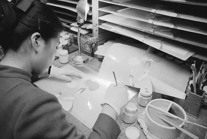 Framed Print : Woman Filling in Outlined Animation Cells Framed Print : Woman Filling in Outlined Animation Cells