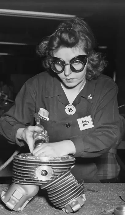 Framed Print : Woman Finishes Cylinder For Plane Engine Framed Print : Woman Finishes Cylinder For Plane Engine