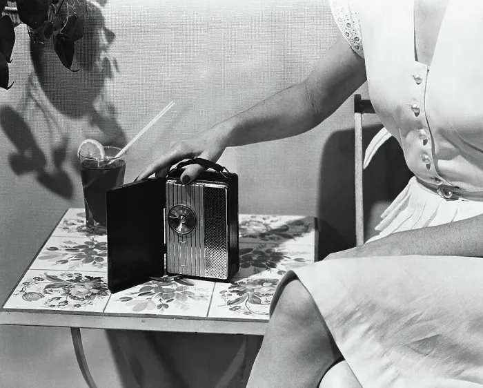 Framed Print : Woman with First Hand Held Personal Radio Framed Print : Woman with First Hand Held Personal Radio