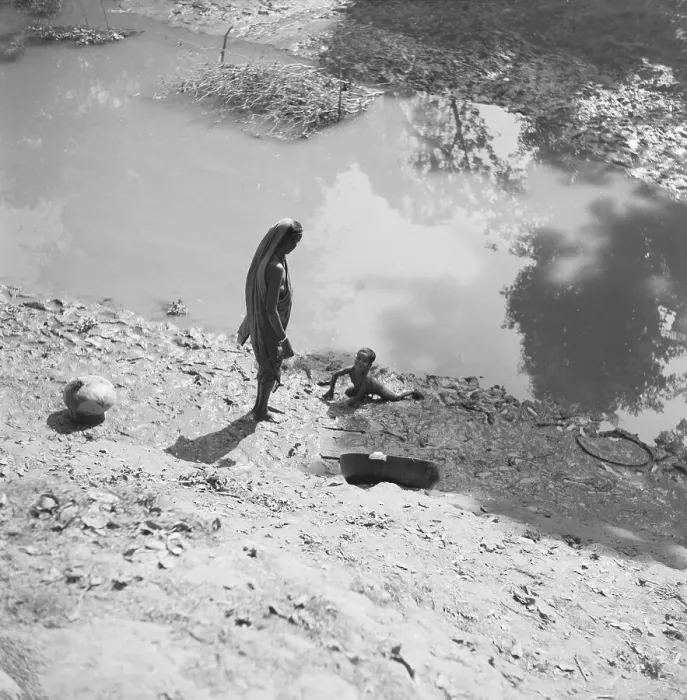 Framed Print : Woman Gathering Youngsters Playing on Edge of River Framed Print : Woman Gathering Youngsters Playing on Edge of River