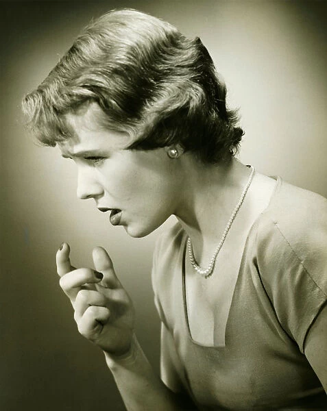 Woman gesturing in studio, (B&W), (Close-up), (Portrait)