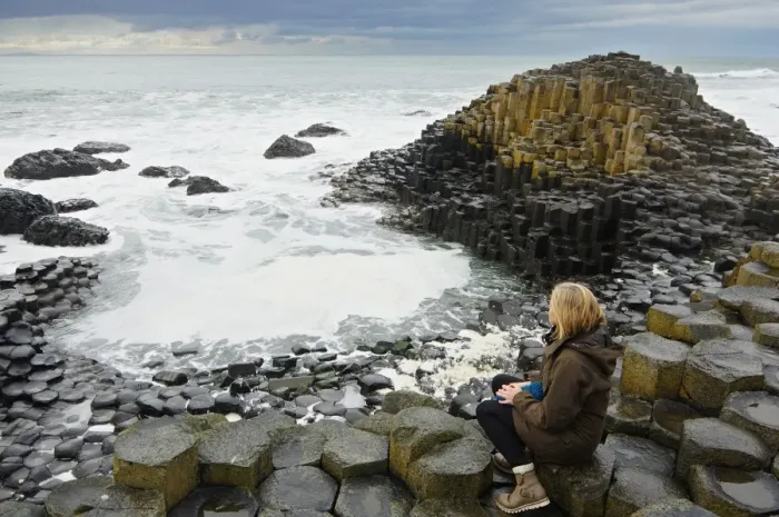 Framed Print : Woman in the Giants Causeway - North Ireland - United Kingdom Framed Print : Woman in the Giants Causeway - North Ireland - United Kingdom