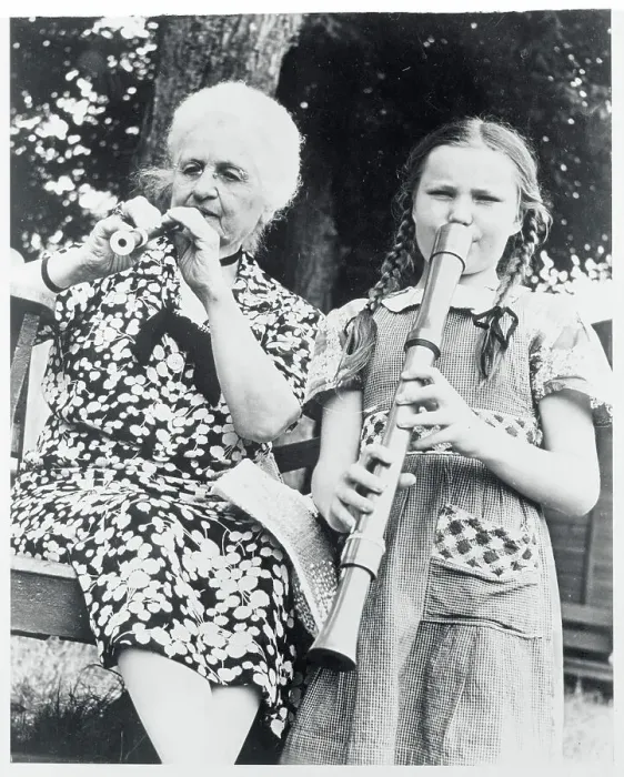 Framed Print : Woman and Girl Playing Recorders