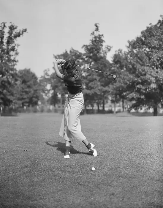 Framed Print : Woman Golfer In Mid-Swing Framed Print : Woman Golfer In Mid-Swing