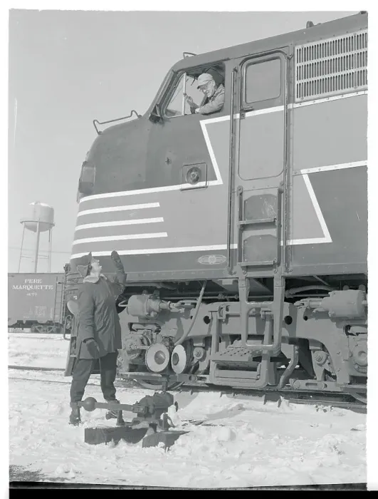 Framed Print : Woman on Ground Greeting Train Engineer Framed Print : Woman on Ground Greeting Train Engineer
