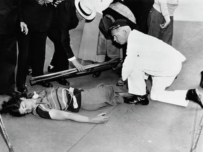 Framed Print : Woman On The Ground At Protest Framed Print : Woman On The Ground At Protest