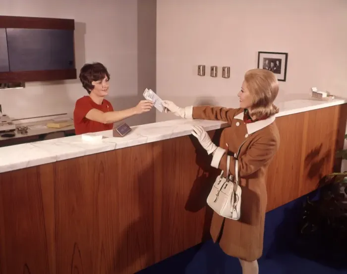 Framed Print : Woman Handing Deposit To Bank Teller Banking Women Framed Print : Woman Handing Deposit To Bank Teller Banking Women