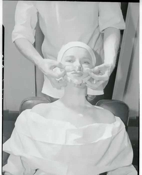Framed Print : Woman Having Face Trussed Framed Print : Woman Having Face Trussed