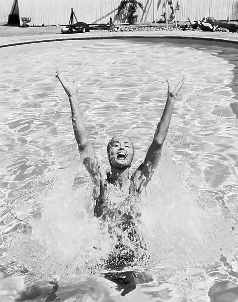 Woman having fun in swimming pool