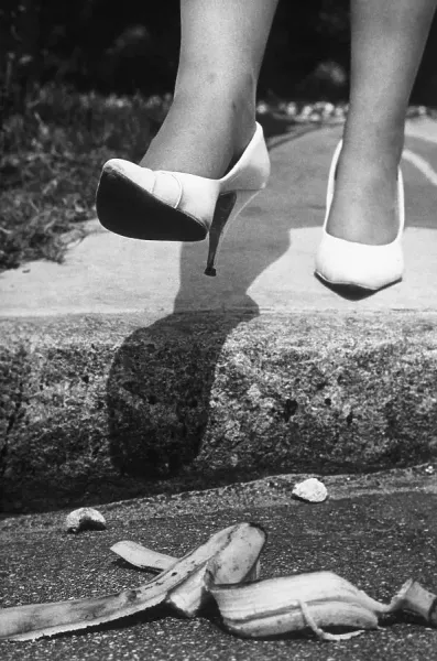Woman in Heels Stepping on Banana Peel Print, Art