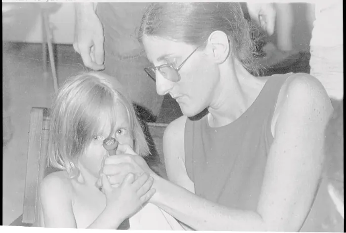 Framed Print : Woman Helping Young Child Smoke Pipe Framed Print : Woman Helping Young Child Smoke Pipe