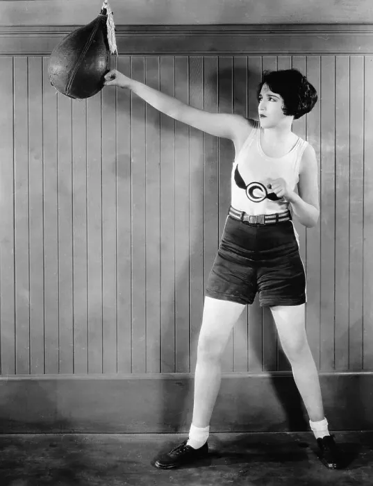 Framed Print : Woman Hitting Punching Bag; Boxing Outfi Framed Print : Woman Hitting Punching Bag; Boxing Outfi