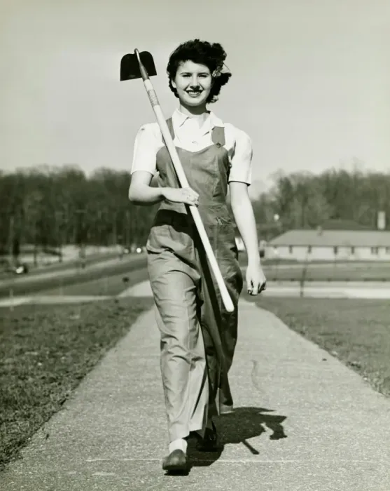 Framed Print : Woman with hoe walking on path, (B&W), portrait Framed Print : Woman with hoe walking on path, (B&W), portrait