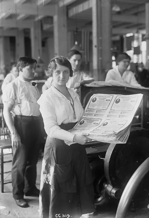 Framed Print : Woman Holding Brand New War Bonds Framed Print : Woman Holding Brand New War Bonds