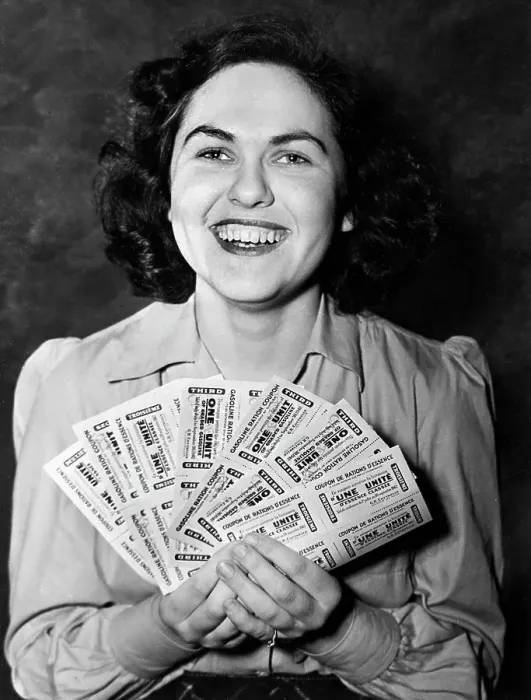 Framed Print : Woman Holding Canadian Gas Ration Coupons Framed Print : Woman Holding Canadian Gas Ration Coupons