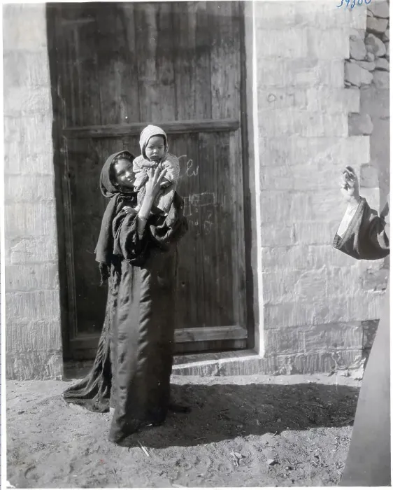 Framed Print : Woman Holding up Her Child on Street Framed Print : Woman Holding up Her Child on Street