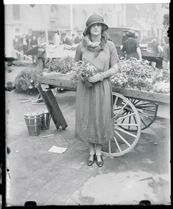 Framed Print : Woman Holding Flowers Framed Print : Woman Holding Flowers