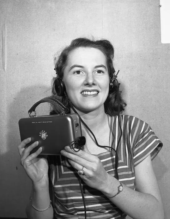 Framed Print : Woman Holding a Geiger Counter Framed Print : Woman Holding a Geiger Counter