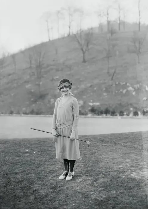 Framed Print : Woman Holding a Golf Club Framed Print : Woman Holding a Golf Club