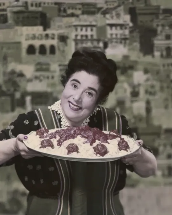 Framed Print : Woman holding prepared fettuccine with meatballs Framed Print : Woman holding prepared fettuccine with meatballs
