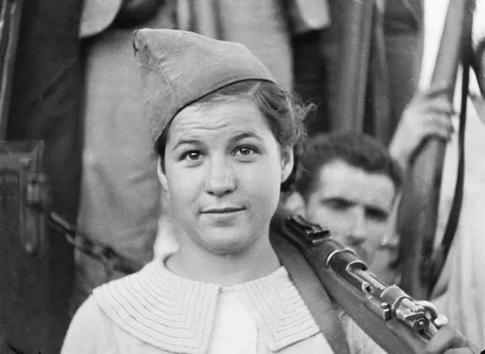 Framed Print : Woman Holding Rifle on Shoulder Framed Print : Woman Holding Rifle on Shoulder