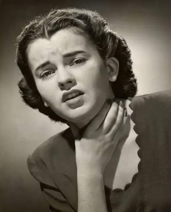 Framed Print : Woman holding sore throat Framed Print : Woman holding sore throat