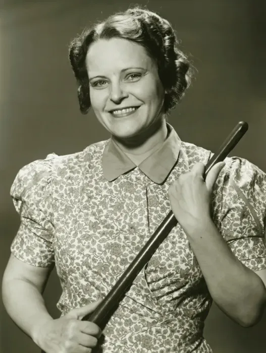 Framed Print : Woman holding stick, posing in studio, (B&W), portrait Framed Print : Woman holding stick, posing in studio, (B&W), portrait