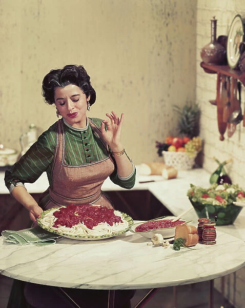 Woman holding tray of noodles and gesturing