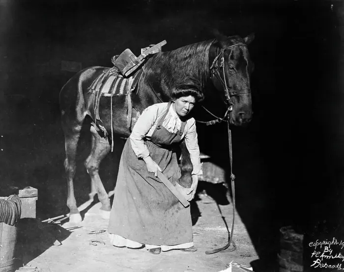 Framed Print : Woman Horse-Shoer Filing A Hoof Framed Print : Woman Horse-Shoer Filing A Hoof