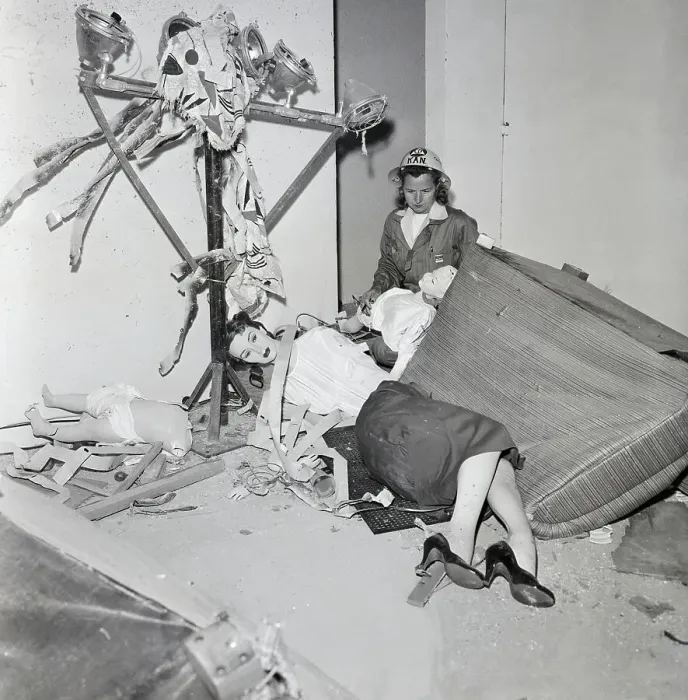 Framed Print : Woman Inspecting Mannequins; Atomic Test Framed Print : Woman Inspecting Mannequins; Atomic Test