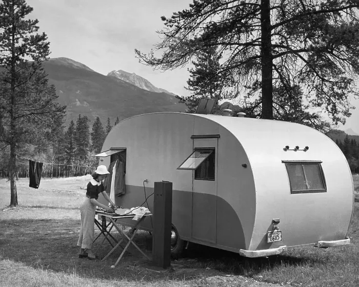 Framed Print : Woman Ironing Laundry Outside Camping Trailer Framed Print : Woman Ironing Laundry Outside Camping Trailer