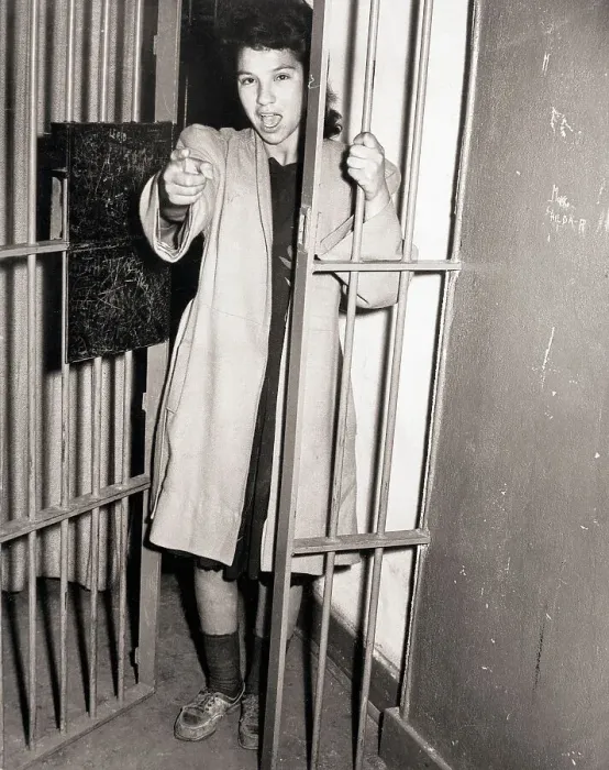 Framed Print : Woman in Jail Cell Pointing and Yelling Framed Print : Woman in Jail Cell Pointing and Yelling