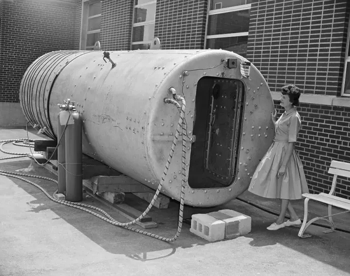 Framed Print : Woman Looking Over Compression Tank Framed Print : Woman Looking Over Compression Tank