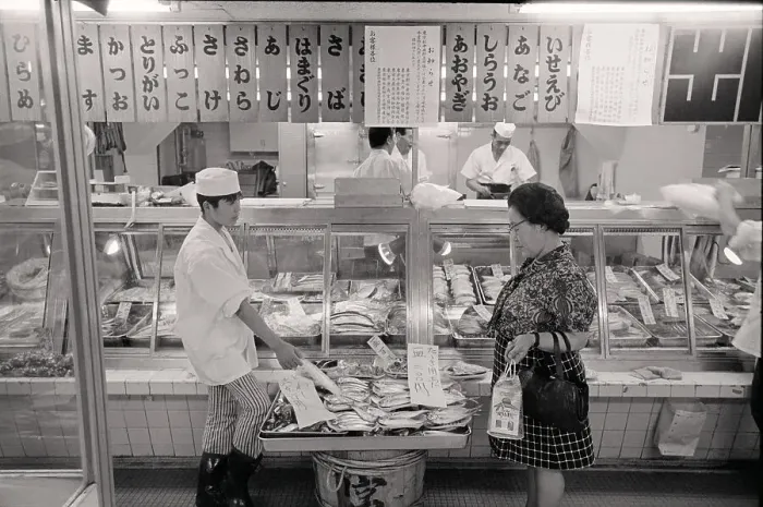 Framed Print : Woman Looking @ Fish In Fish Market;Japa Framed Print : Woman Looking @ Fish In Fish Market;Japa