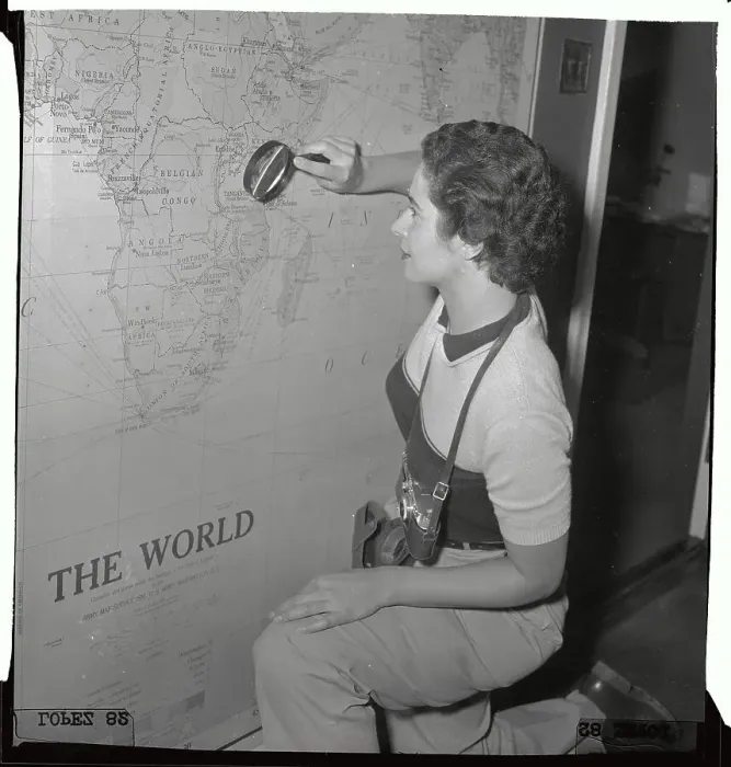 Framed Print : Woman Looking at Map Framed Print : Woman Looking at Map