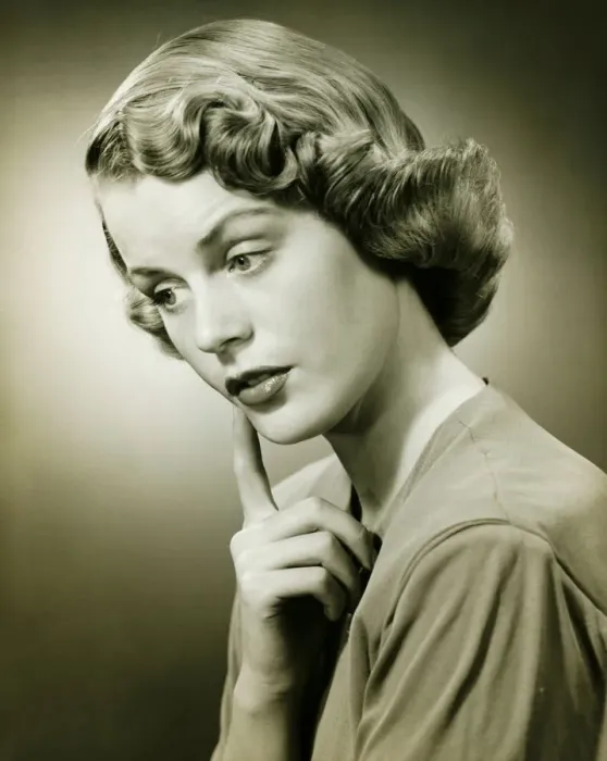 Framed Print : Woman looking thoughtful, posing in studio, (B&W), (Portrait) Framed Print : Woman looking thoughtful, posing in studio, (B&W), (Portrait)
