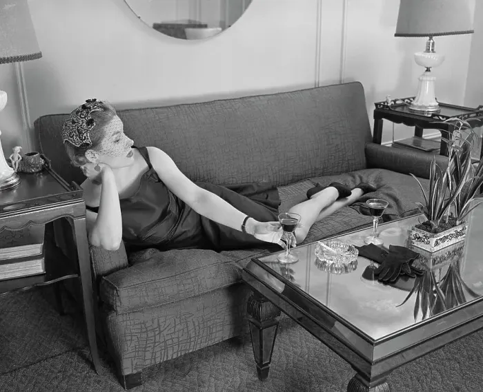Framed Print : Woman Lounging on Sofa Framed Print : Woman Lounging on Sofa