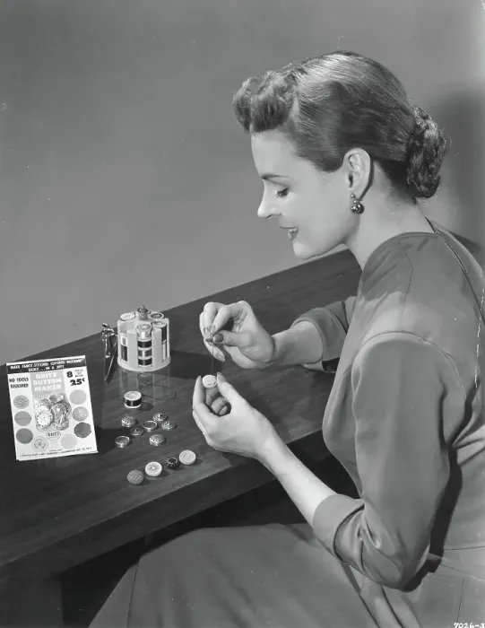 Framed Print : Woman Making Buttons with Kit Framed Print : Woman Making Buttons with Kit