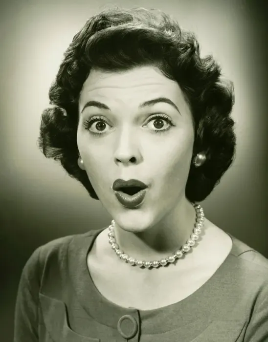 Framed Print : Woman making face in studio, (B&W), close-up, portrait Framed Print : Woman making face in studio, (B&W), close-up, portrait